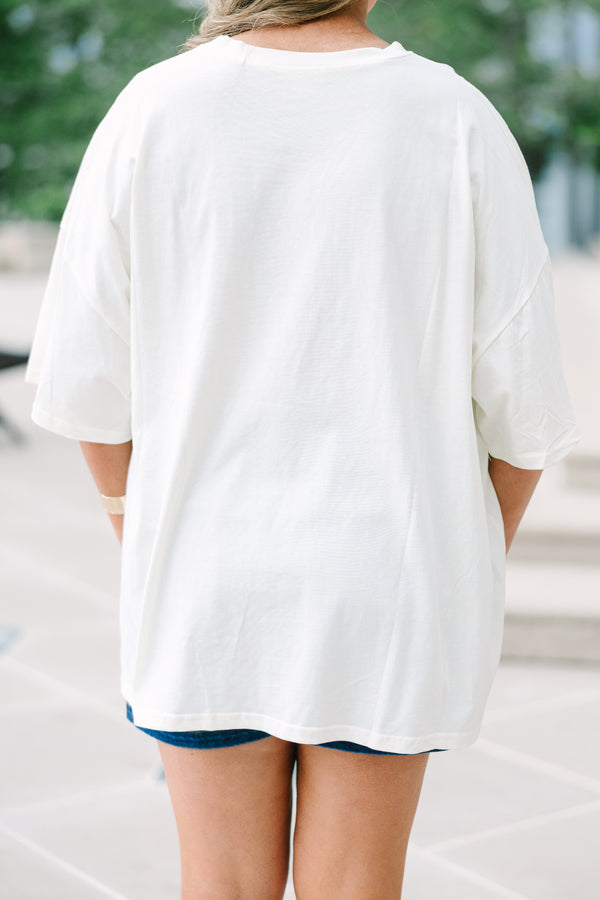 Chic Soul Plus Size Clothing, Oversized ivory boyfriend tee with a colorful Enjoy the Good graphic and relaxed short sleeves.