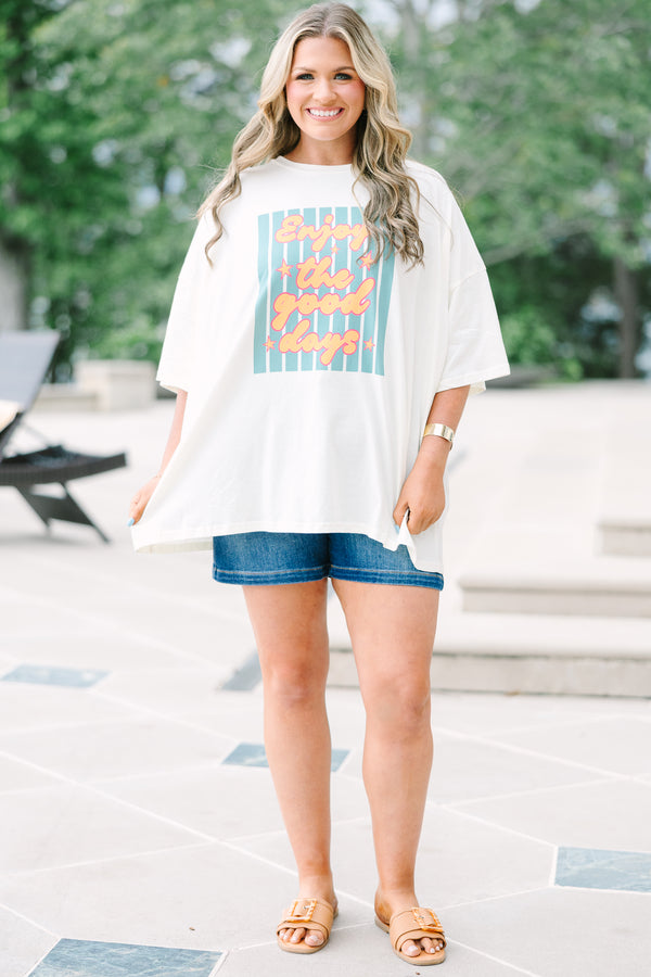 Chic Soul Plus Size Clothing, Oversized ivory boyfriend tee with a colorful Enjoy the Good graphic and relaxed short sleeves.
