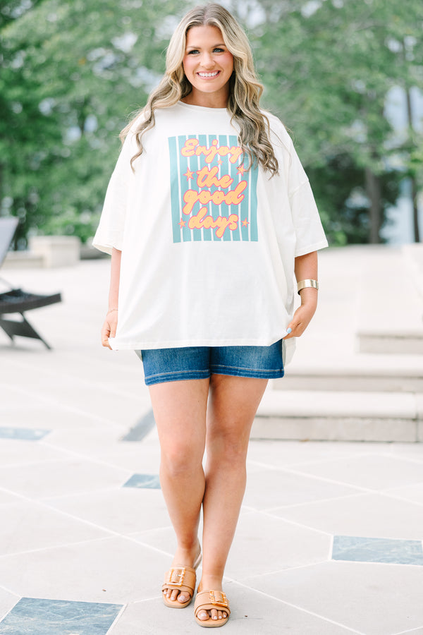 Chic Soul Plus Size Clothing, Oversized ivory boyfriend tee with a colorful Enjoy the Good graphic and relaxed short sleeves.