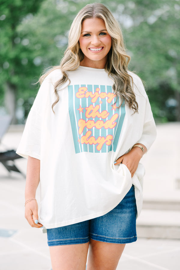 Chic Soul Plus Size Clothing, Oversized ivory boyfriend tee with a colorful Enjoy the Good graphic and relaxed short sleeves.