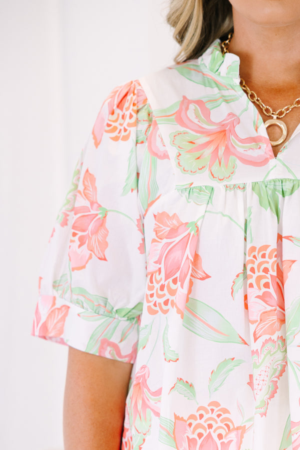 Plus Size white floral babydoll top with pink and green tropical print and ruffled neckline.