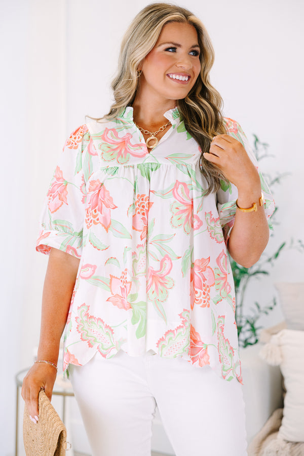Plus Size white floral babydoll top with pink and green tropical print and ruffled neckline.