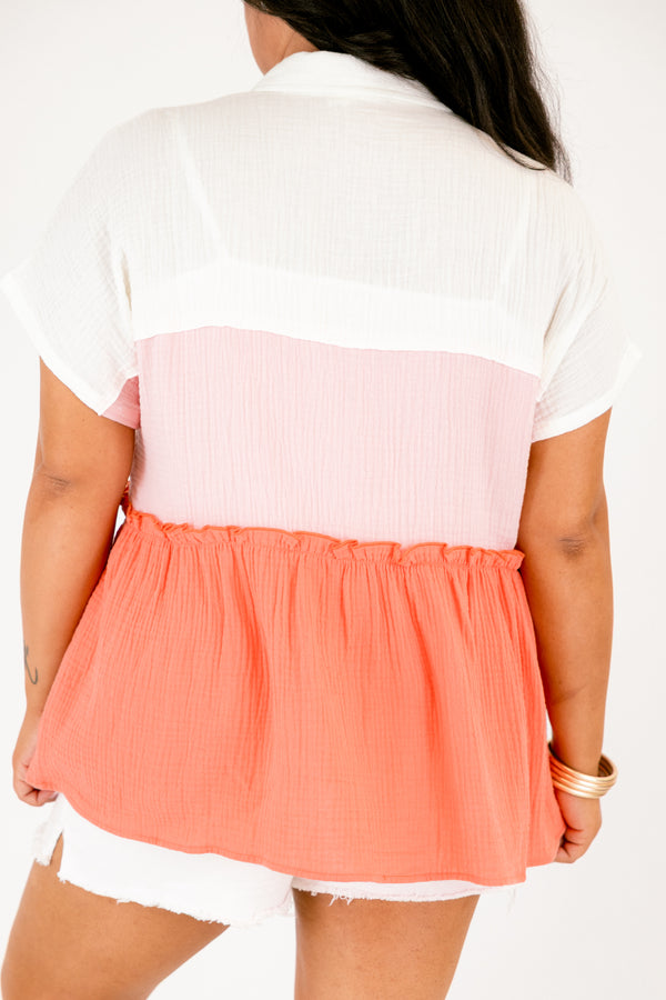 Chic Soul plus size clothing, orange layered top with a white layer on the shoulder and beginning of the chest area a light pink layer on from the top of the chest to the bottom and a orange ruffle layer on the end of the shirt as well as buttons going down to the bottom of the chest and a collar 