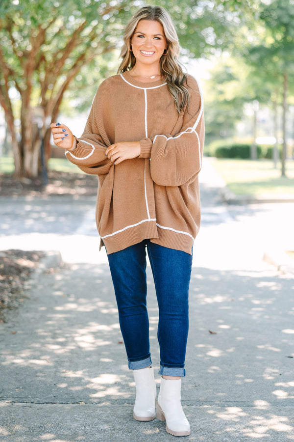 Plus Size brown oversized knit sweater with white contrast piping and a crew neckline.