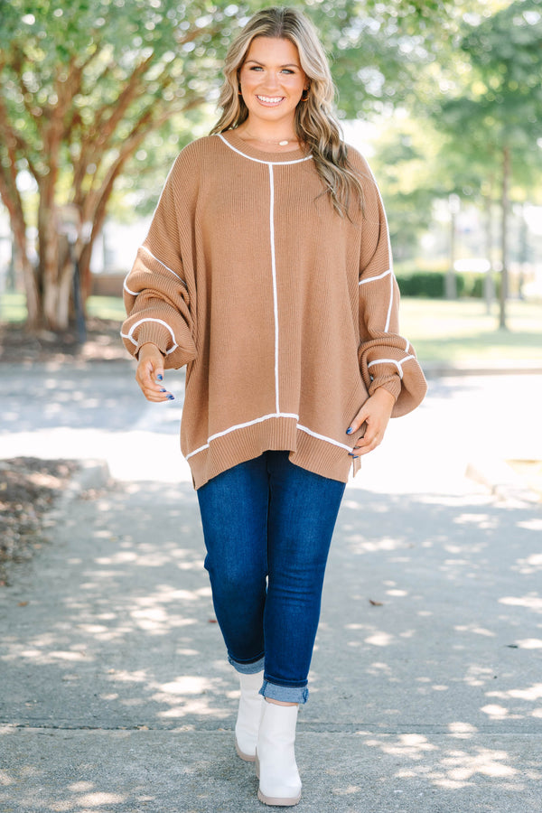 Plus Size brown oversized knit sweater with white contrast piping and a crew neckline.