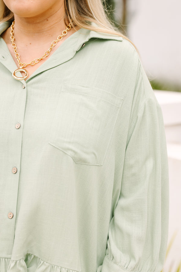 Chic Soul plus size clothing, sage button up long sleeve top with a ruffle detail on the bottom of the top and a collar 