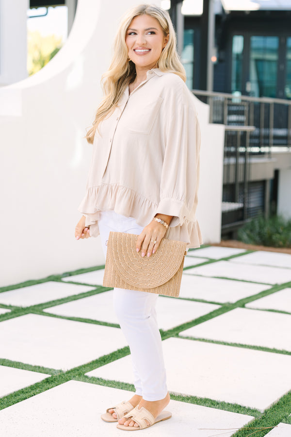 Chic Soul plus size clothing, tan long sleeve top with collar and buttons down the front and a ruffle babydoll style hem at the bottom of the top
