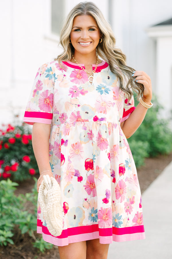 Chic Soul plus size clothing,  white knee length dress with a floral pattern throughout the dress as well as pink and red thick stripes at the bottom of the dress around the neckline and end of each sleeve