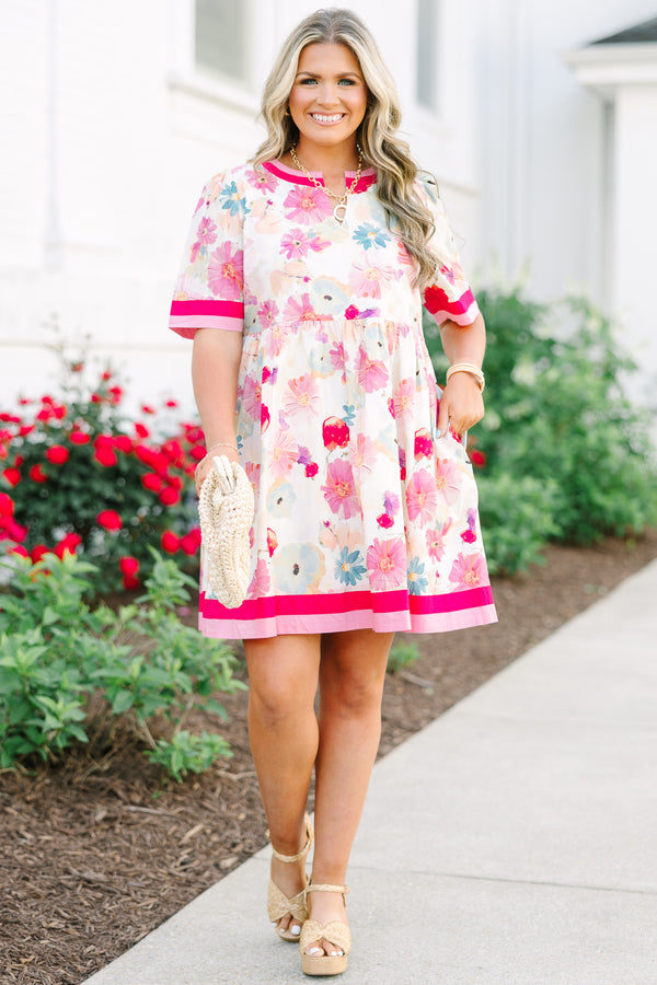 Chic Soul plus size clothing,  white knee length dress with a floral pattern throughout the dress as well as pink and red thick stripes at the bottom of the dress around the neckline and end of each sleeve