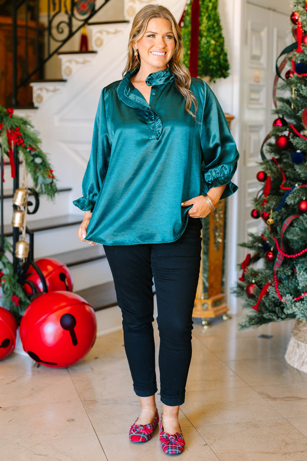 Plus size emerald satin top with a ruffled neckline, functional buttons, and elastic puff sleeves.