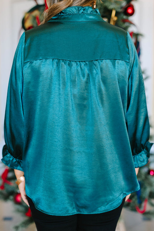 Plus size emerald satin top with a ruffled neckline, functional buttons, and elastic puff sleeves.