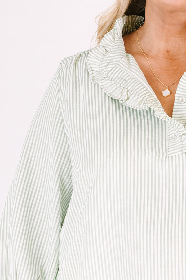 Chic Soul plus size clothing, green striped top with half sleeves that have ruffles at the end of each sleeve as well as ruffle detailing going along the collar and down the v-neckline