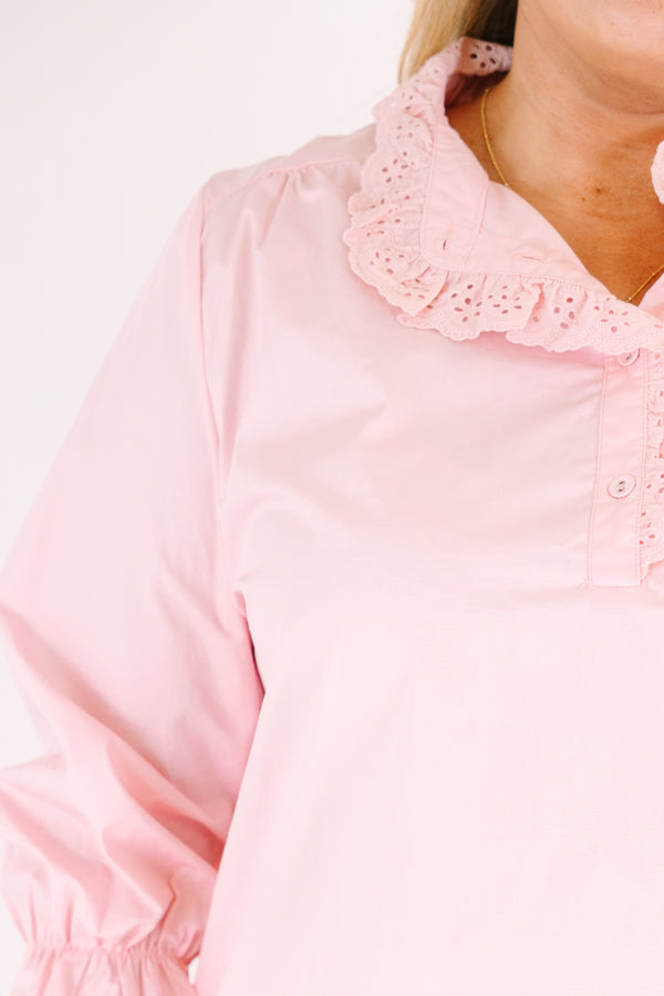 Chic Soul plus size clothing, pink top with half sleeves with a ruffle flare out on the end of each sleeve and buttons going along the center of the top to the middle of the chest that have a lace ruffle detail 