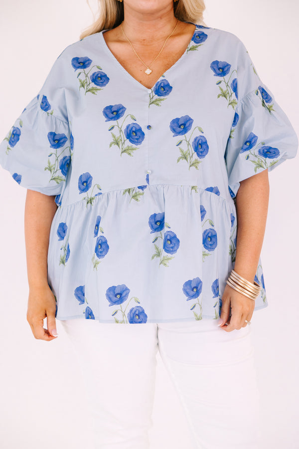 Chic Soul plus size clothing, light blue v neck short puff sleeve peplum baby doll top with dark blue flowers scattered on it