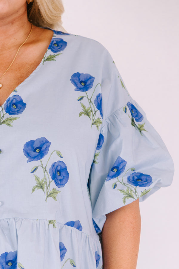 Chic Soul plus size clothing, light blue v neck short puff sleeve peplum baby doll top with dark blue flowers scattered on it