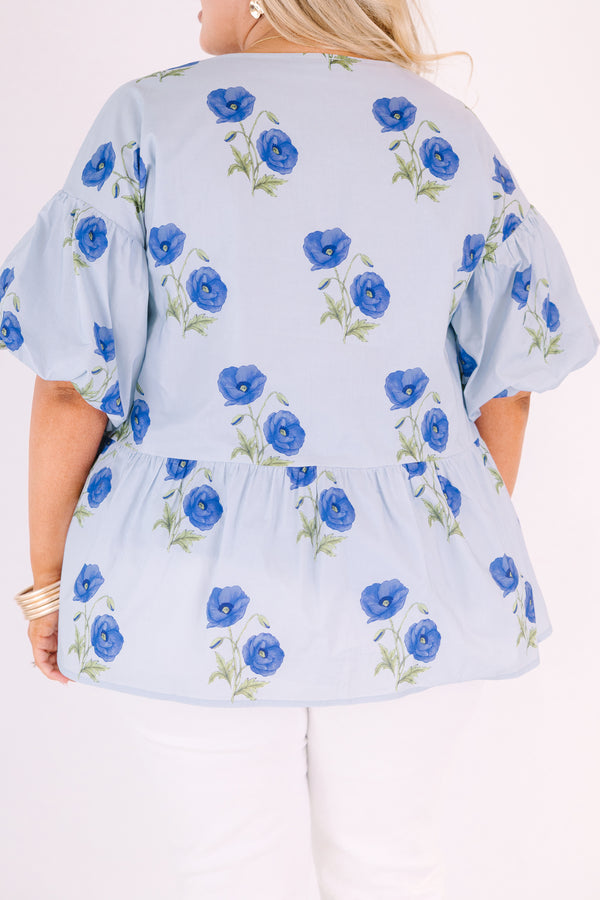 Chic Soul plus size clothing, light blue v neck short puff sleeve peplum baby doll top with dark blue flowers scattered on it
