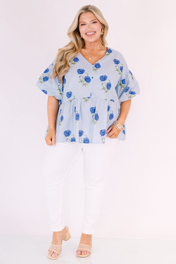 Chic Soul plus size clothing, light blue v neck short puff sleeve peplum baby doll top with dark blue flowers scattered on it