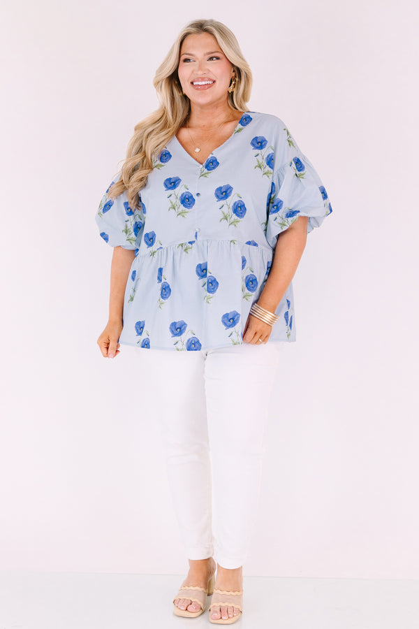 Chic Soul plus size clothing, light blue v neck short puff sleeve peplum baby doll top with dark blue flowers scattered on it