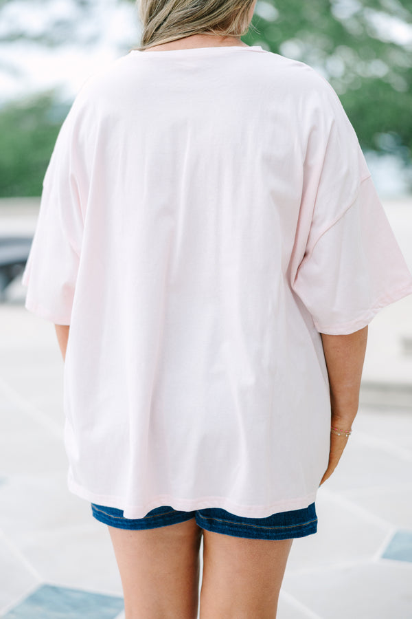 Plus Size cream pink boyfriend tee with a marlin graphic and blue stripes, paired with denim shorts.