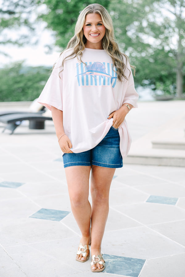 Plus Size cream pink boyfriend tee with a marlin graphic and blue stripes, paired with denim shorts.