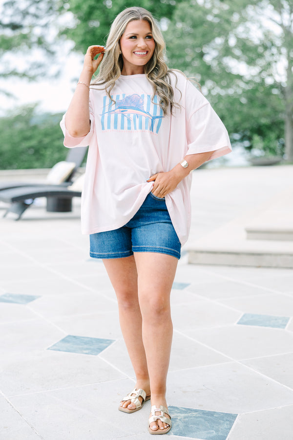 Plus Size cream pink boyfriend tee with a marlin graphic and blue stripes, paired with denim shorts.