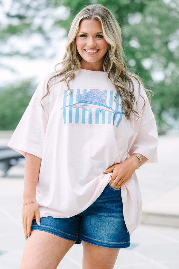 Plus Size cream pink boyfriend tee with a marlin graphic and blue stripes, paired with denim shorts.