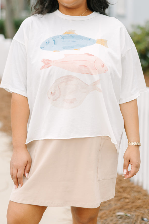 Chic Soul plus size clothing, white short sleeve graphic tee with three different fish graphics on the center of the shirt going horizontal and the color of the fish are blue light red and light brown 
