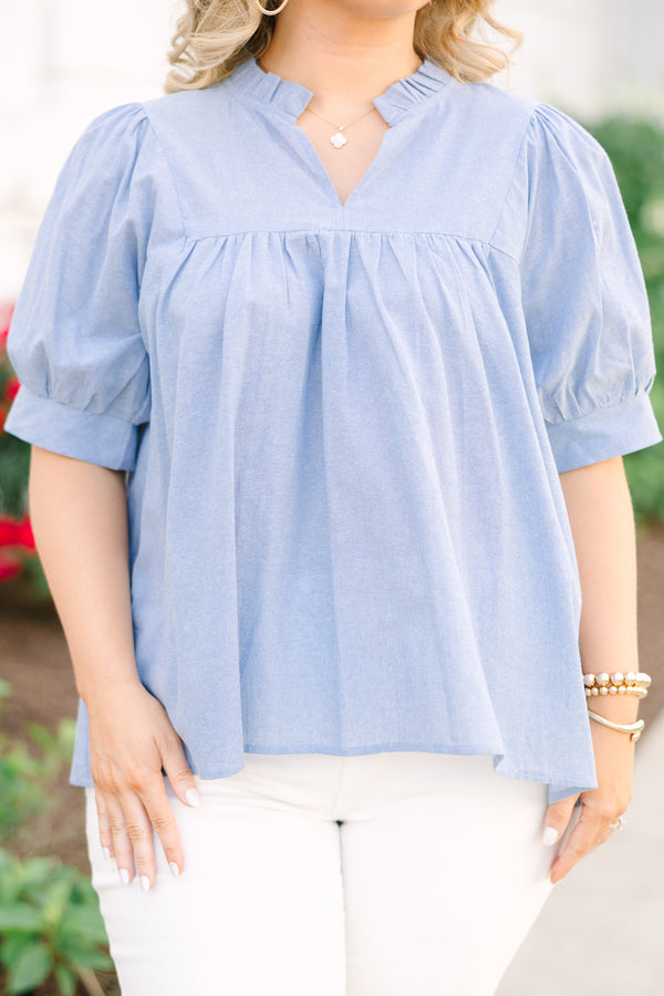 Chic Soul plus size clothing, a top in chambray with ruffle details at the collar, puff sleeves, and gathering details just above the bust