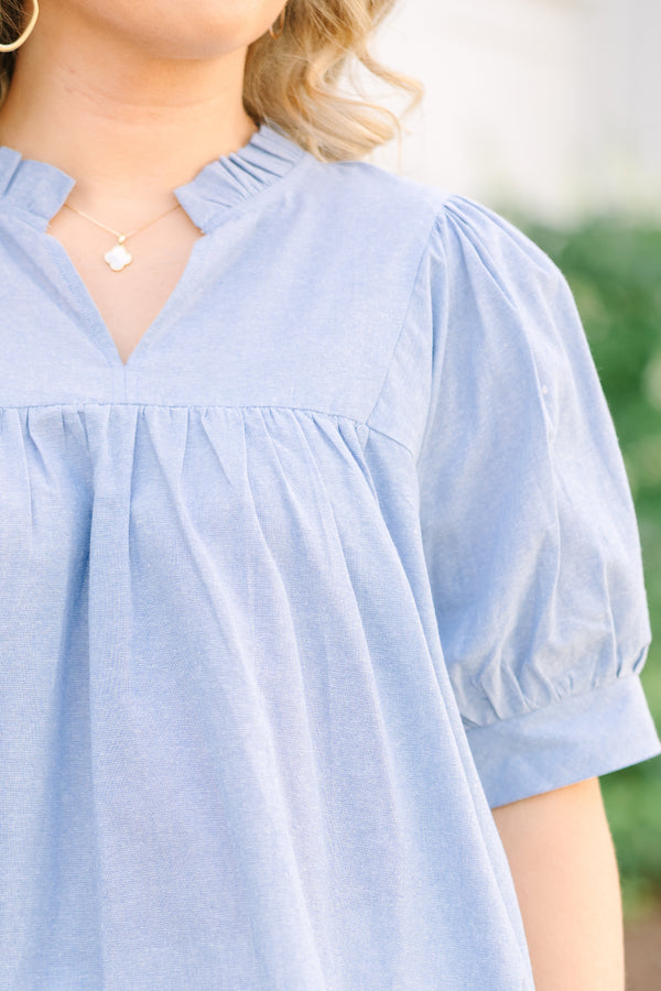 Chic Soul plus size clothing, a top in chambray with ruffle details at the collar, puff sleeves, and gathering details just above the bust