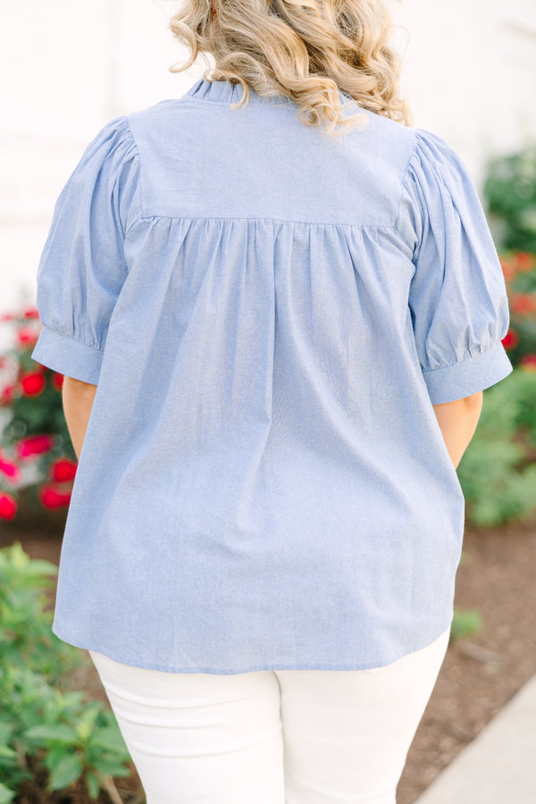 Chic Soul plus size clothing, a top in chambray with ruffle details at the collar, puff sleeves, and gathering details just above the bust