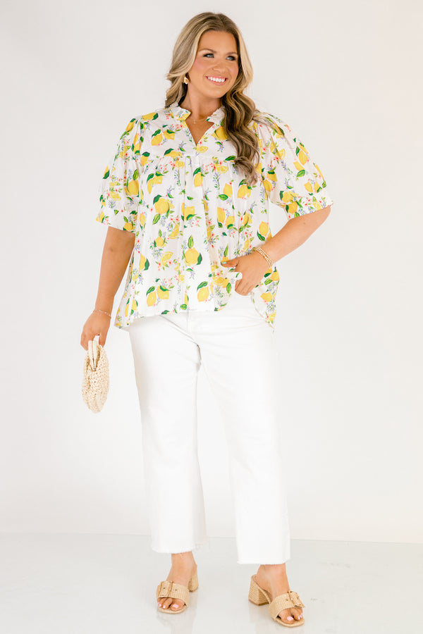 Chic Soul plus size clothing, white short sleeve top with yellow lemon print design through the top, v-neckline, and slight ruffle collar