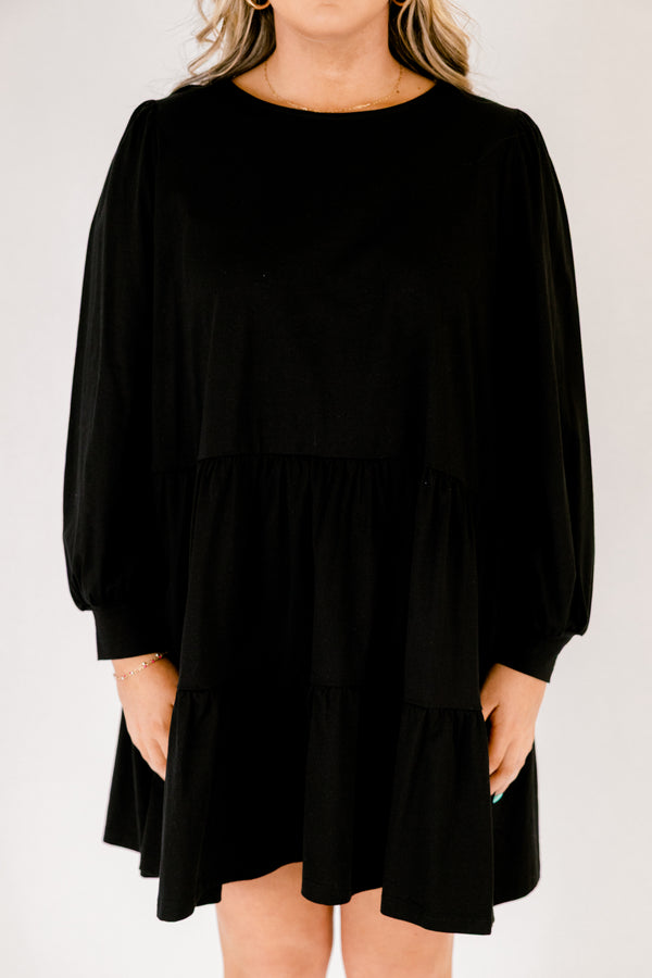 Chic Soul plus size clothing, solid black knee length dress with a high neckline and long sleeves that have cuffs at the end of each sleeve 