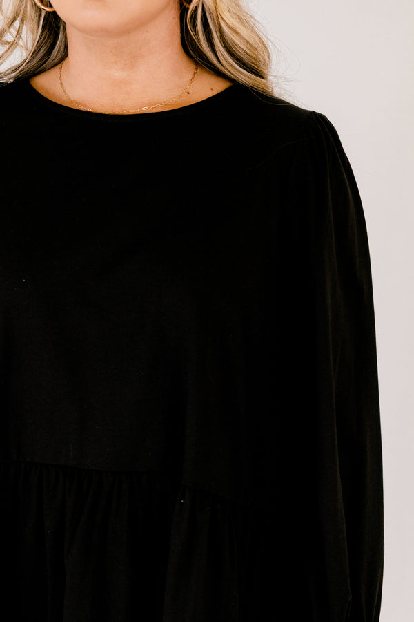Chic Soul plus size clothing, solid black knee length dress with a high neckline and long sleeves that have cuffs at the end of each sleeve 