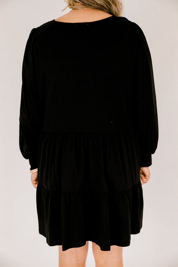 Chic Soul plus size clothing, solid black knee length dress with a high neckline and long sleeves that have cuffs at the end of each sleeve 