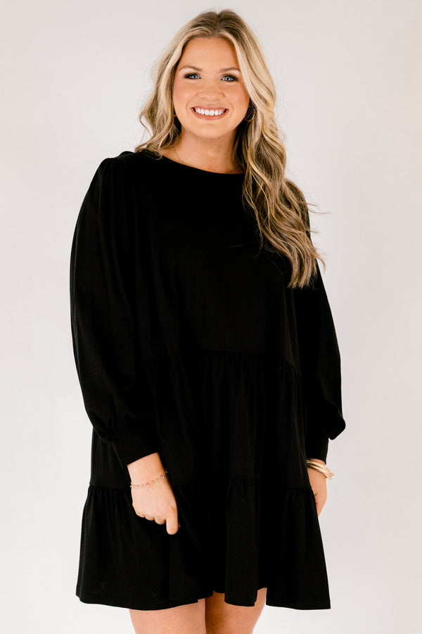  Chic Soul plus size clothing, solid black knee length dress with a high neckline and long sleeves that have cuffs at the end of each sleeve 