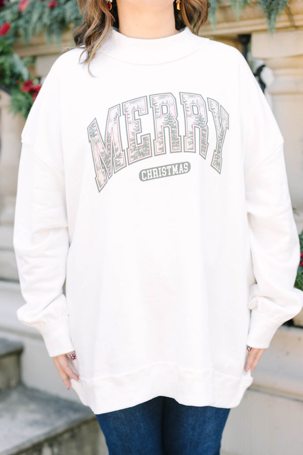 Plus Size ivory mock neck pullover with a graphic 
