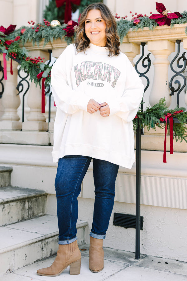Plus Size ivory mock neck pullover with a graphic 