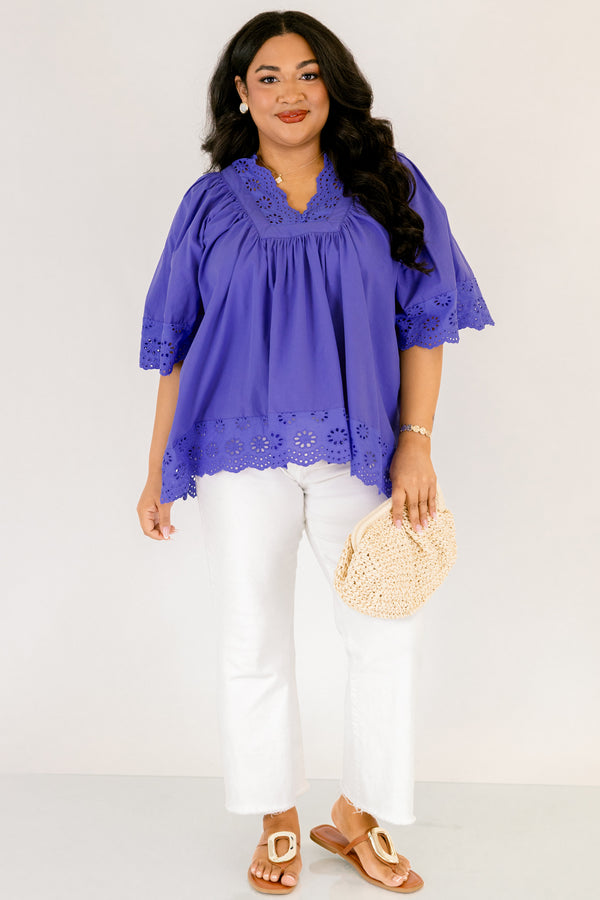 Chic Soul plus size clothing, blue flowy short sleeve top with eyelet detailing on the edges of the sleeves, bottom of top, and bordering v-neckline
