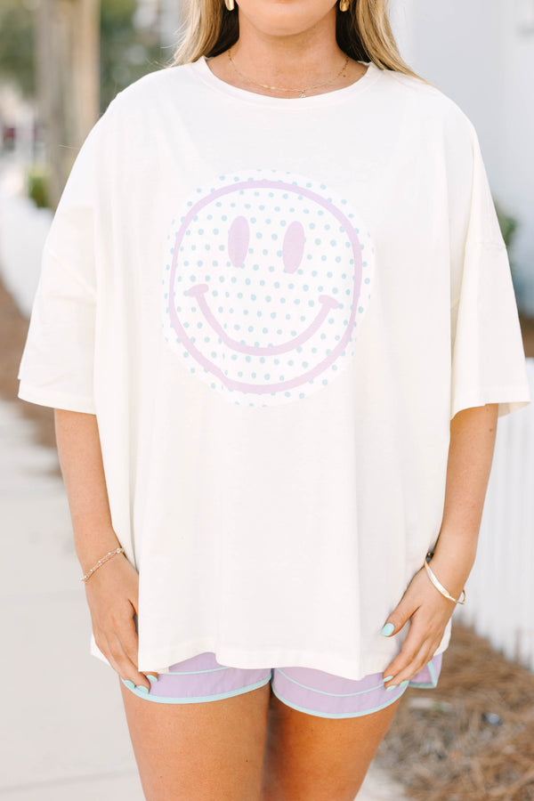 Chic Soul plus size clothing, white short sleeve boyfriend tee with light purple smiley face on white circle background on the front of the tee with light blue polka dots inside of the smiley face