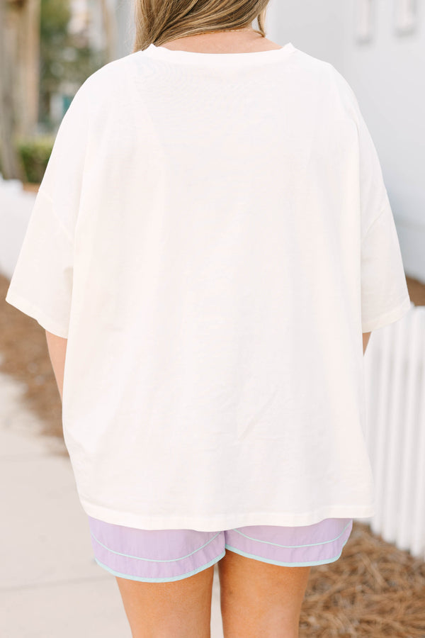 Chic Soul plus size clothing, white short sleeve boyfriend tee with light purple smiley face on white circle background on the front of the tee with light blue polka dots inside of the smiley face