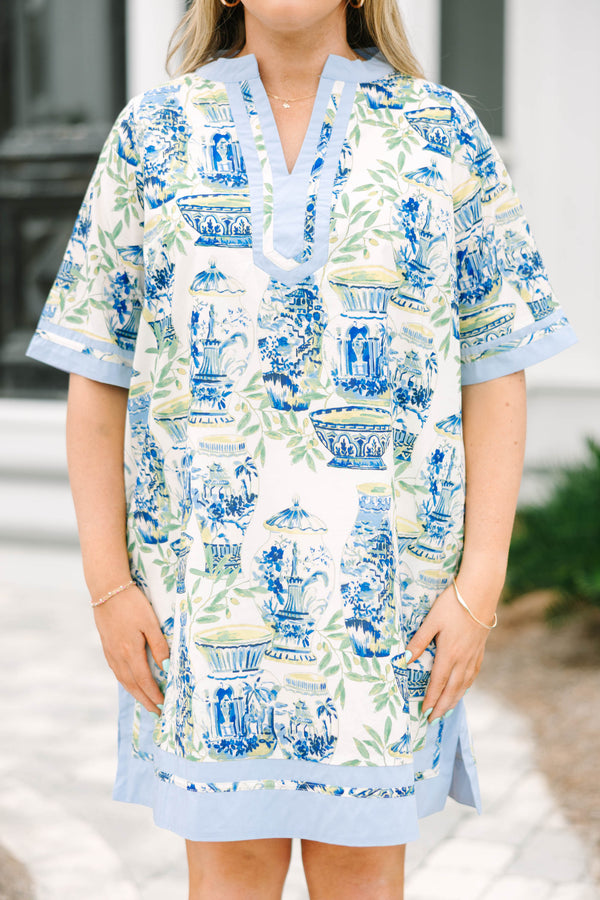 Chic Soul plus size clothing, blue knee length dress with a green and blue toile pattern and light blue outlining the bottom of the sleeves and also going along the v-neckline and bottom of the dress  