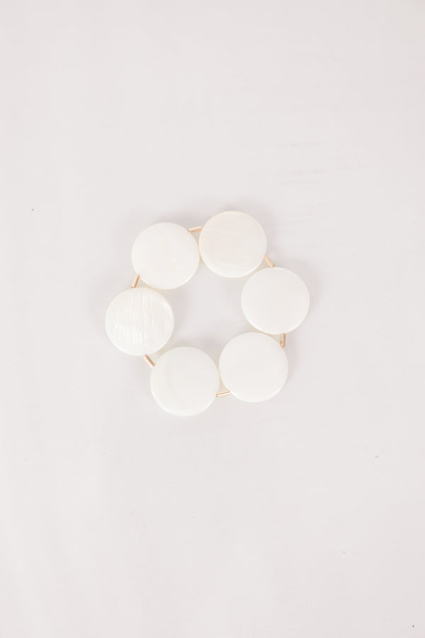 Chic Soul plus size clothing, cream size round jewels on a gold banded bracelet