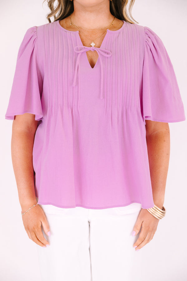Chic Soul plus size clothing, light magenta pink short flutter sleeve top with v neck cutout and a drawstring bow tying across the cutout