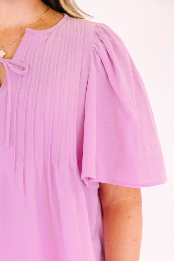 Chic Soul plus size clothing, light magenta pink short flutter sleeve top with v neck cutout and a drawstring bow tying across the cutout