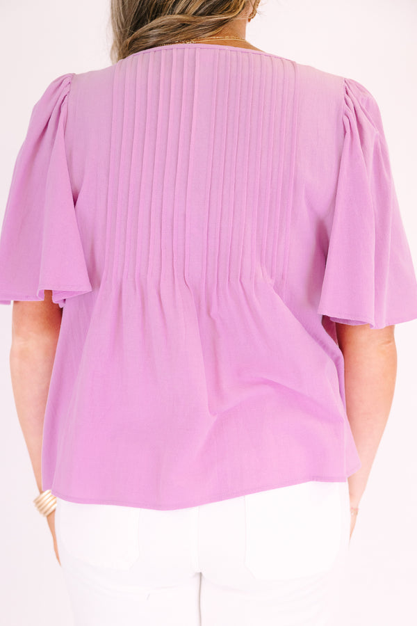 Chic Soul plus size clothing, light magenta pink short flutter sleeve top with v neck cutout and a drawstring bow tying across the cutout