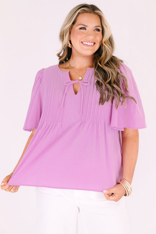 Chic Soul plus size clothing, light magenta pink short flutter sleeve top with v neck cutout and a drawstring bow tying across the cutout