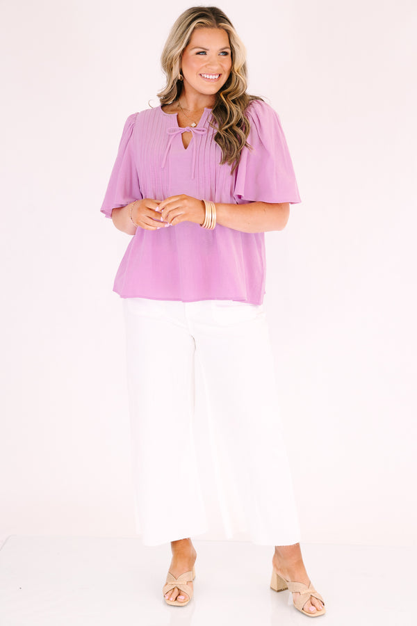Chic Soul plus size clothing, light magenta pink short flutter sleeve top with v neck cutout and a drawstring bow tying across the cutout