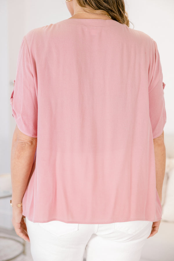 Chic Soul plus size clothing, a button up short sleeve top in dusty pink featuring pockets on both sides of the front chest and a small button detail securing the short sleeves 
