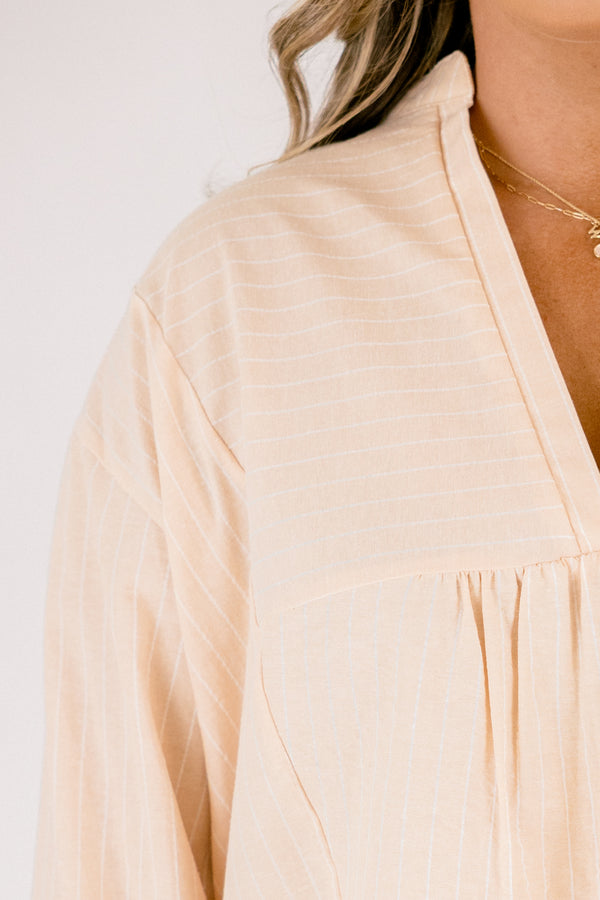 Chic Soul plus size clothing, light tan long sleeve tiered baby doll blouse with deep v neckline and ruffle sleeves
