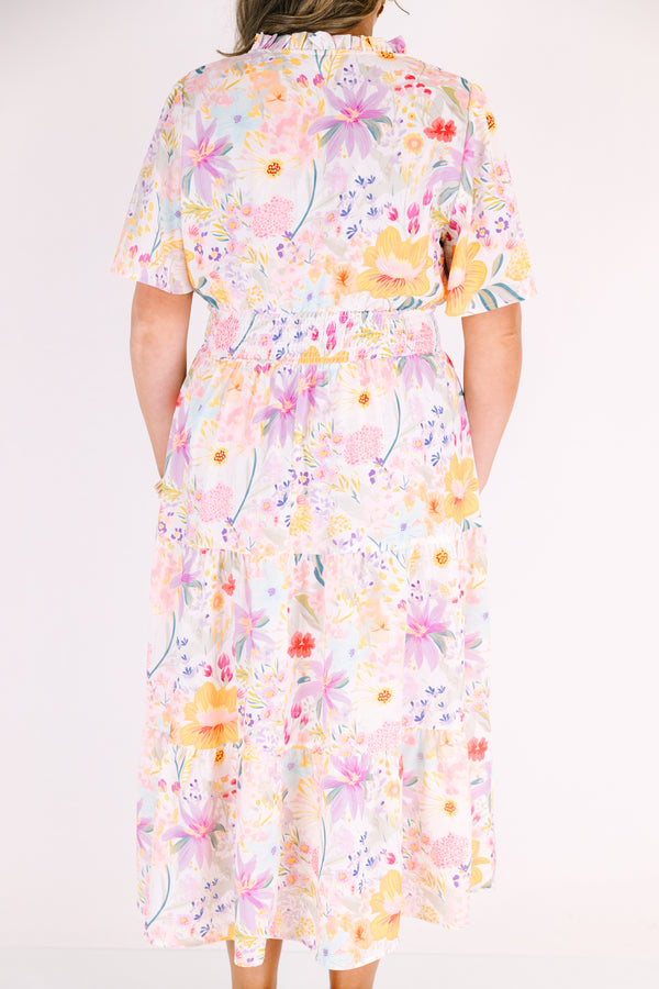 Chic Soul plus size clothing, white maxi dress with short sleeves a cinched waist a slight v-neckline and a multi-color floral pattern throughout 